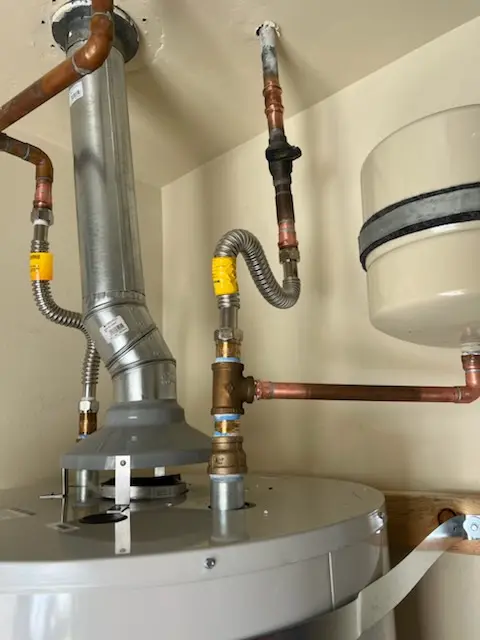 Water heater installation and plumbing repair in Locust Valley